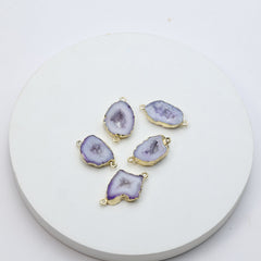 Elongated purple geode druzy charms outlined in gold for jewelry crafting