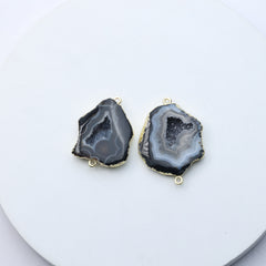 Raw druzy geode slice charms in grey with gold trim for jewelry crafting