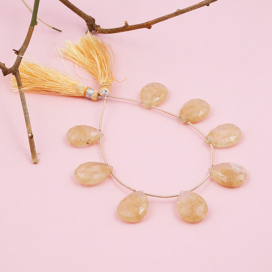 Golden rutile faceted drop beads used for DIY jewelry projects