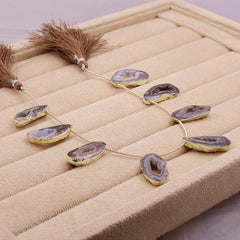 Gold-Framed Pink Agate Necklace with Geode Stones