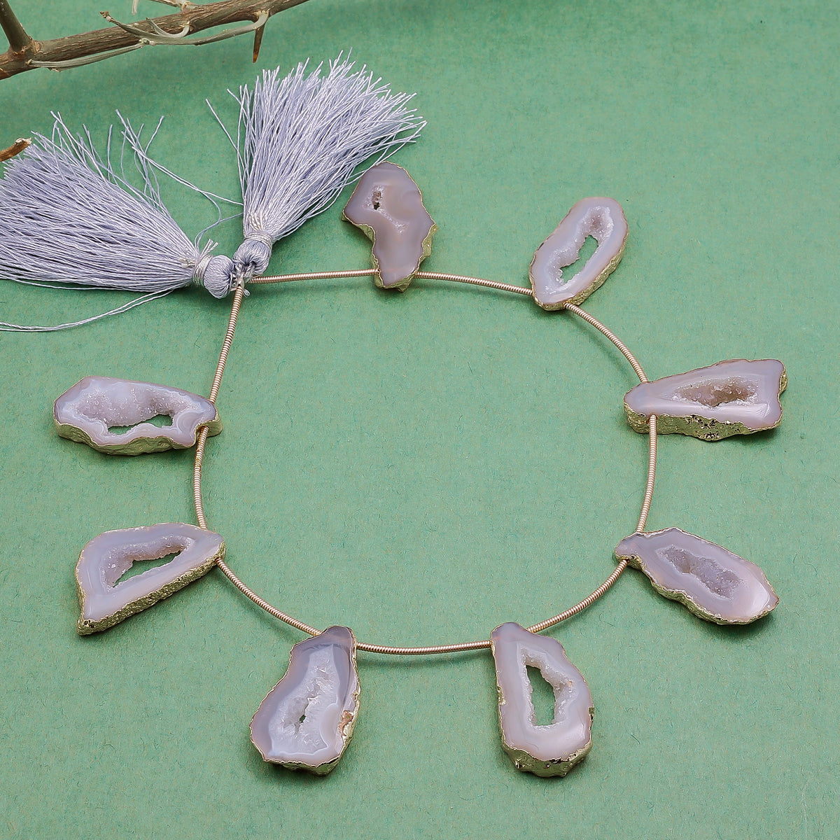 Stylish Pink Geode Necklace with Gold Frame and Tassel Details