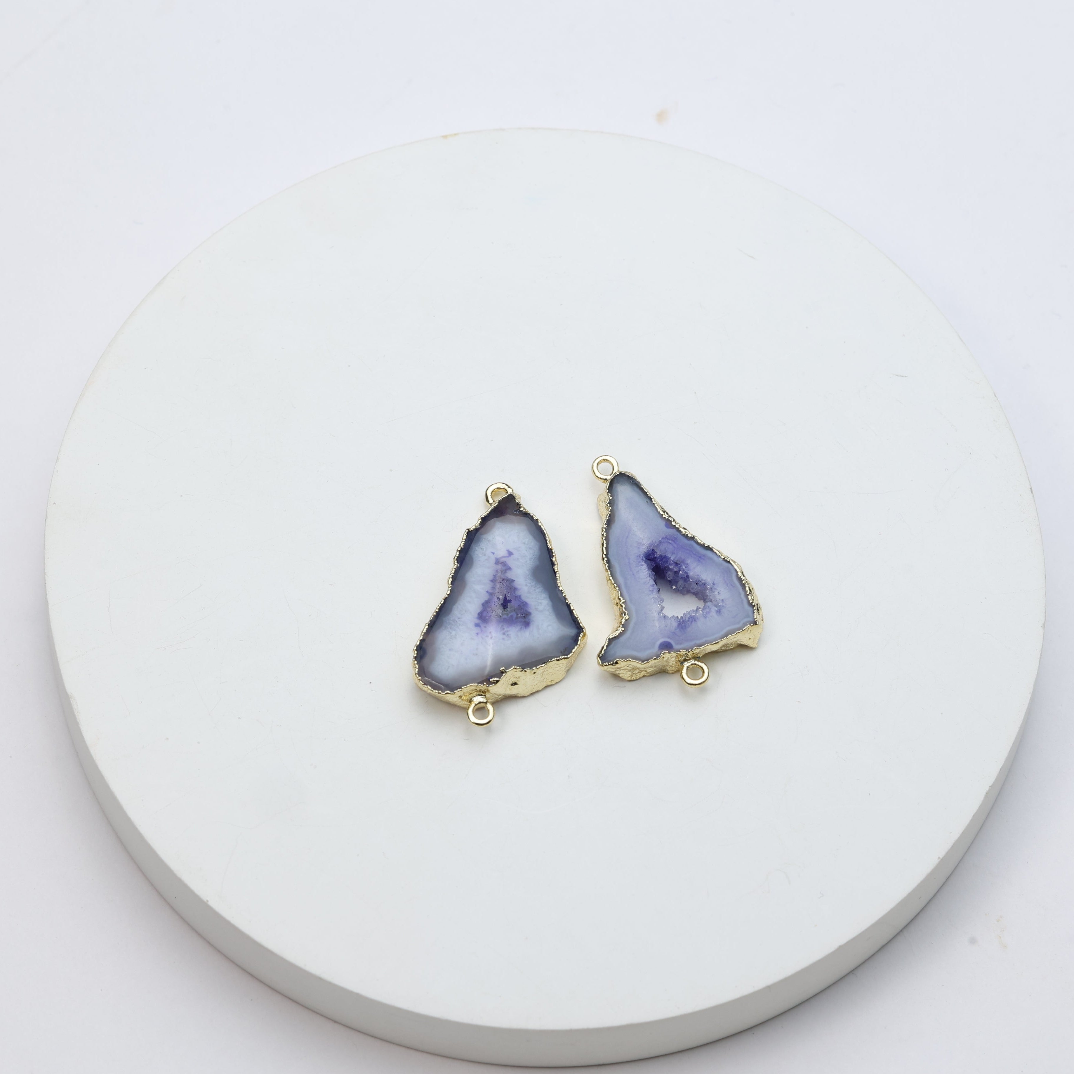 Purple natural geode slice charms with gold-plated edges for crafting necklaces and bracelets