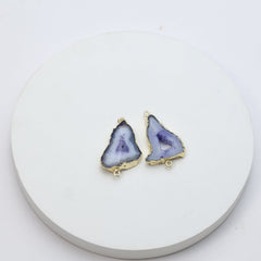 Purple natural geode slice charms with gold-plated edges for crafting necklaces and bracelets