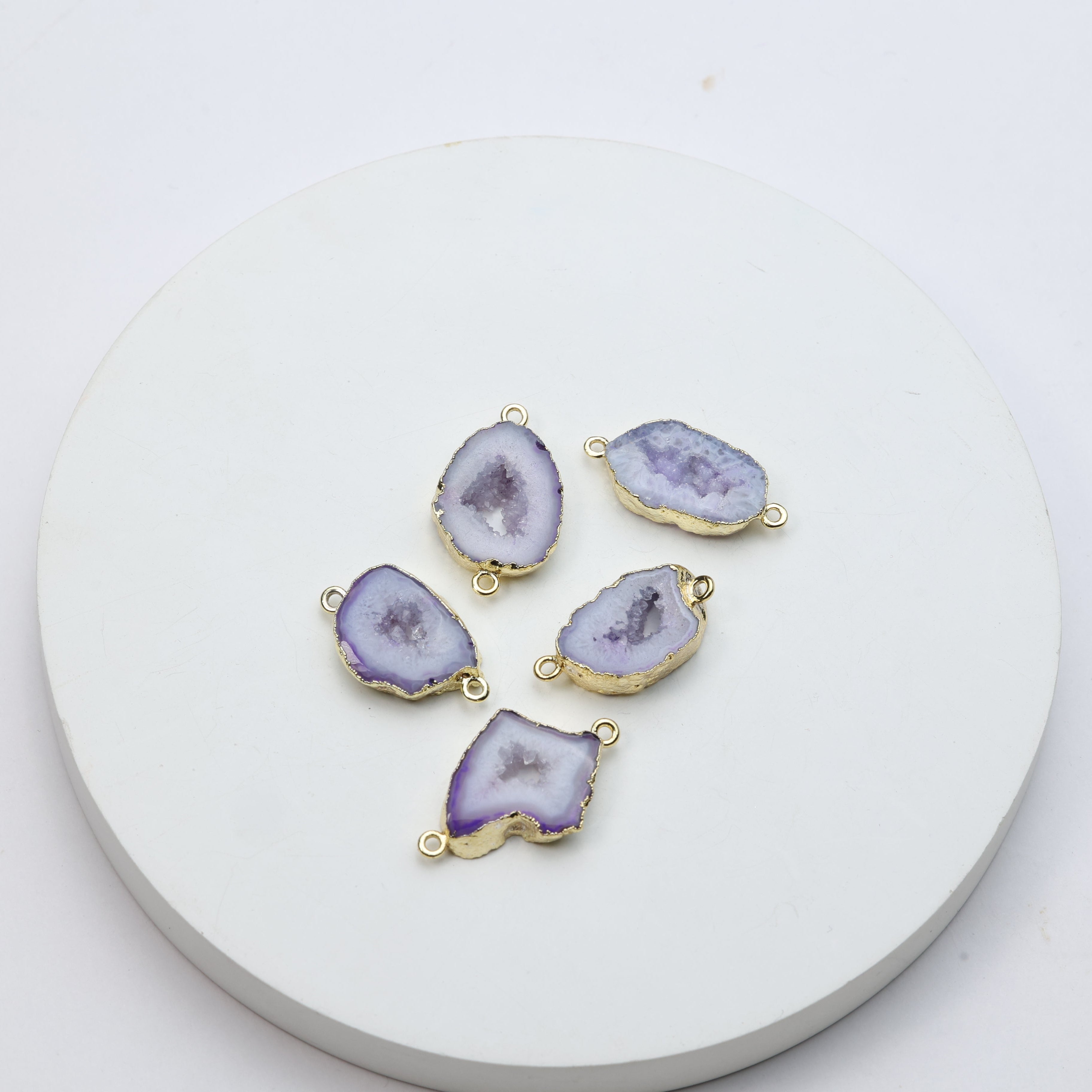 Elongated purple geode druzy charms outlined in gold for jewelry crafting