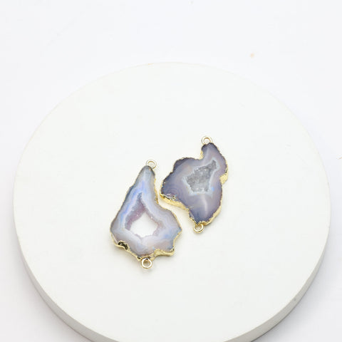 Purple gemstone geode slice pendants with sparkling druzy and gold-plated edges