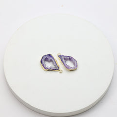 Vertical purple geode slice charms with gold-plated rims for jewelry making