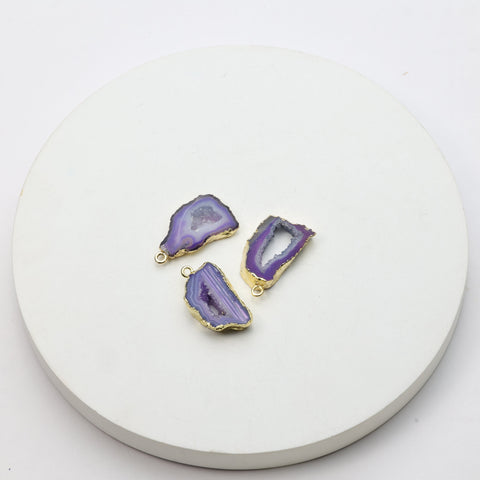 Vibrant purple druzy geode slice connectors with gold accents for crafting jewelry pieces