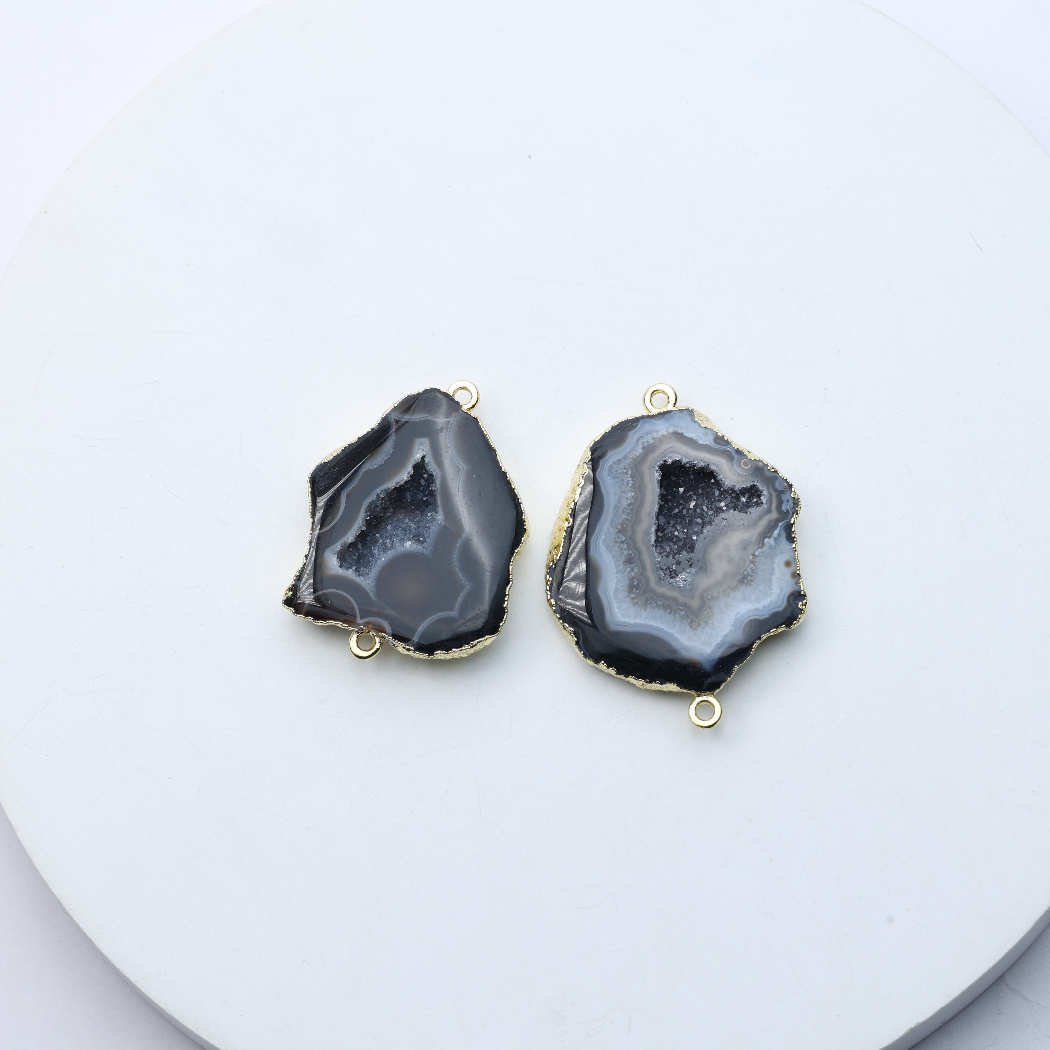 Raw druzy geode slice charms in grey with gold trim for jewelry crafting
