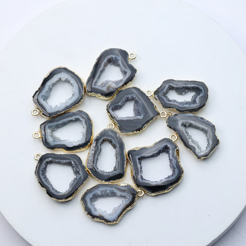 Irregular grey geode slice pendants with druzy crystals and gold trim