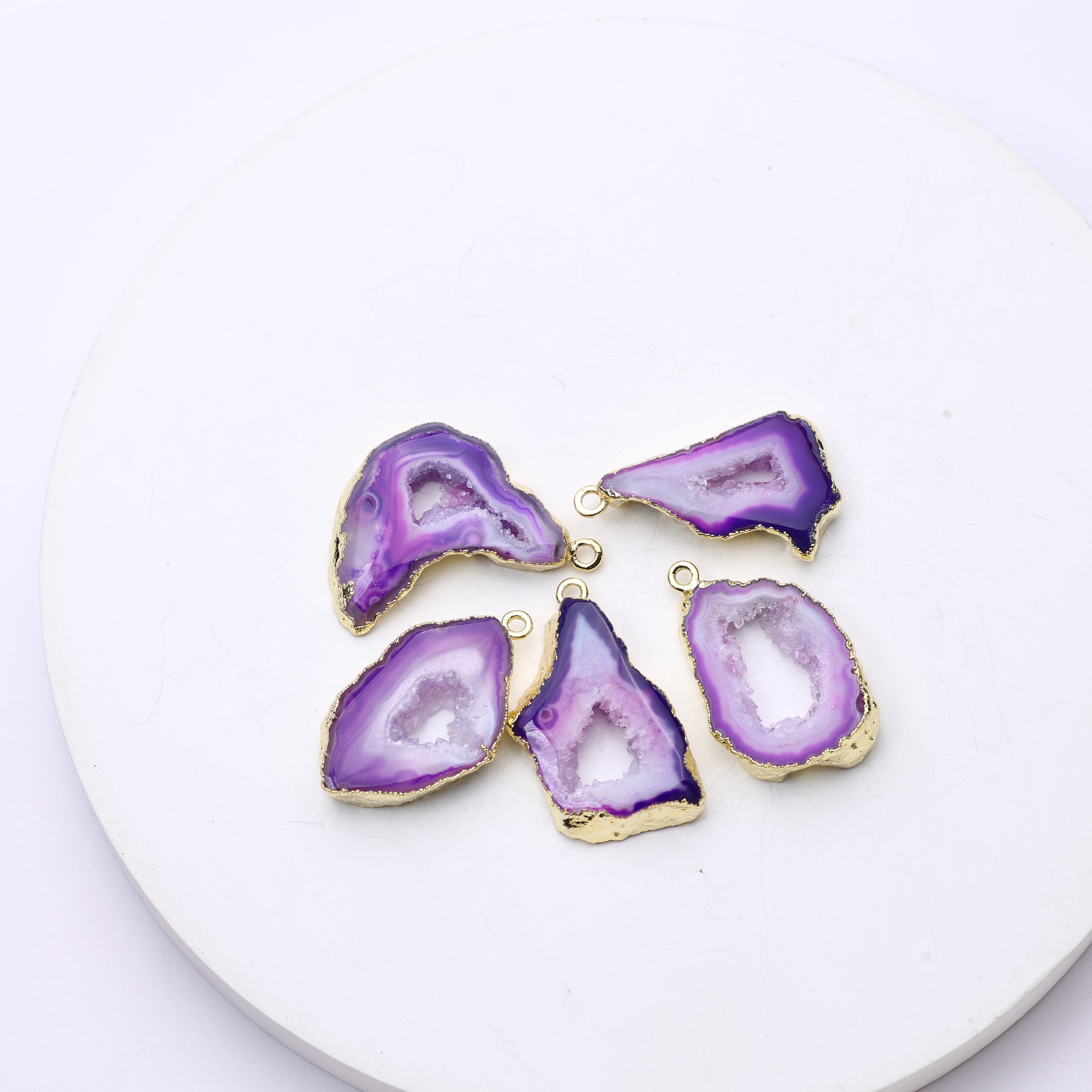 Purple geode slice gemstone connectors with shimmering druzy surfaces and gold trim