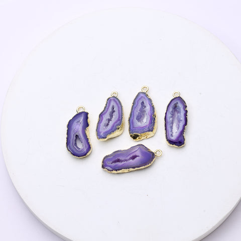 Glossy purple geode slice charms with natural druzy sparkle and gold-plated outlines