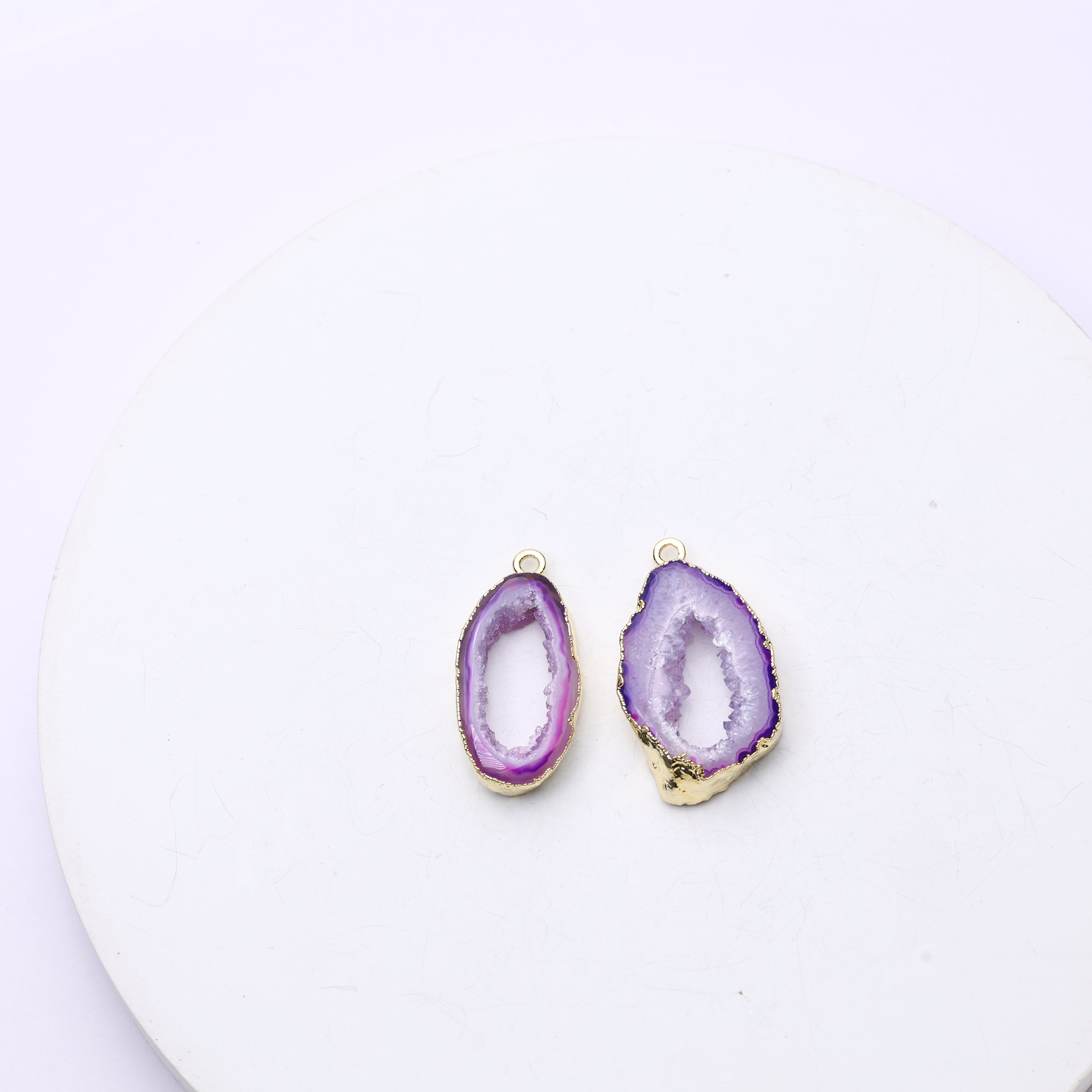 Elongated purple geode shell connectors with natural druzy crystals and gold trim