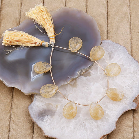 Teardrop briolette gemstone strand in gold blue color