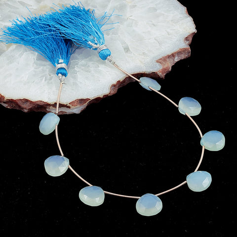 Vibrant blue teardrop gemstones with tassel cord