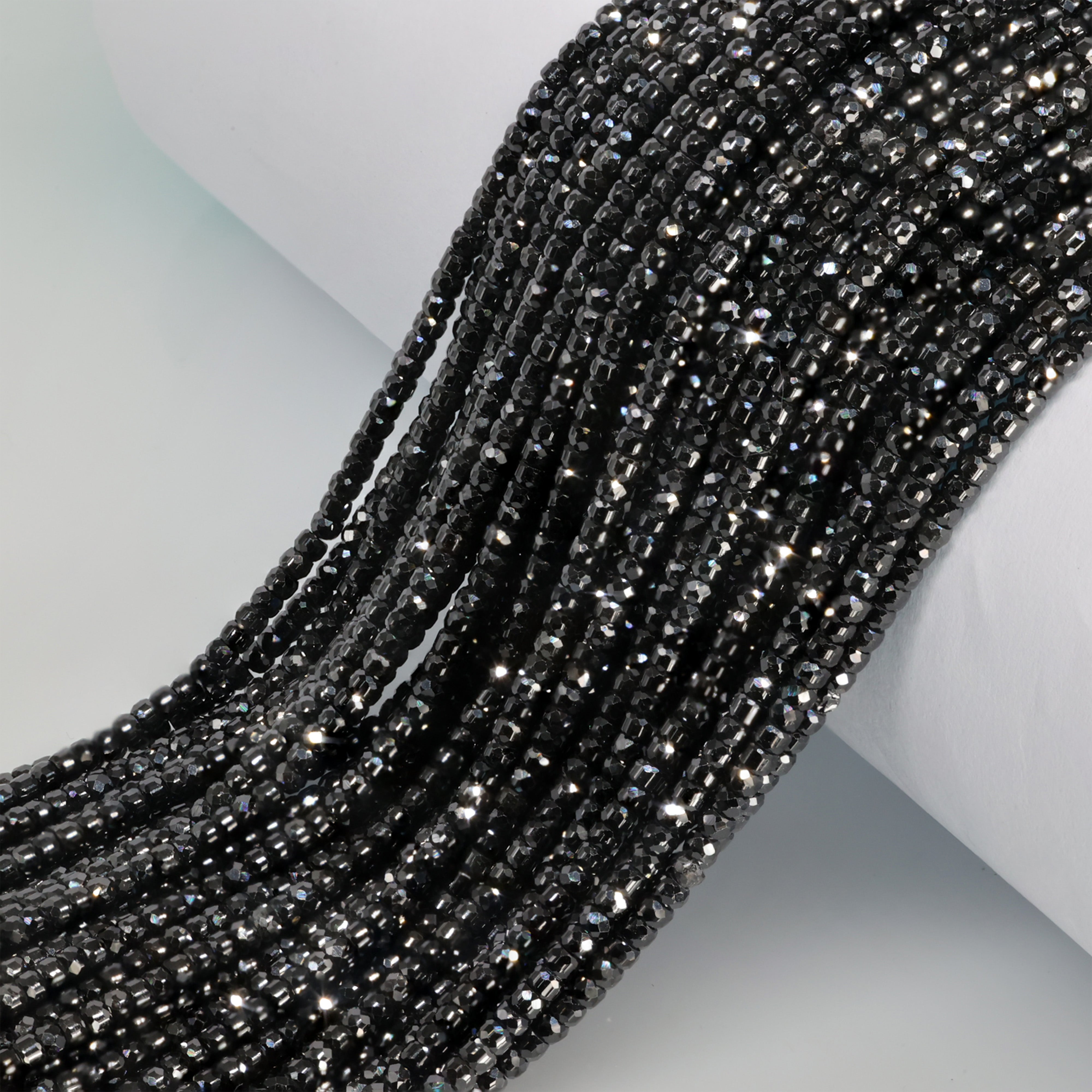 Polished gemstone beads with drilled holes, perfect for bracelets and necklaces